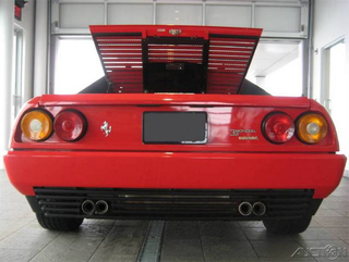 Illustration for article titled Nice Price Or Crack Pipe: 5,944-Mile Ferrari Mondia Cabriolet For $37,995?